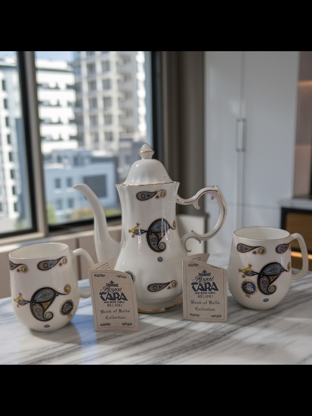 Royal Tara fine bone china coffee set in the highly collectible Book of Kells